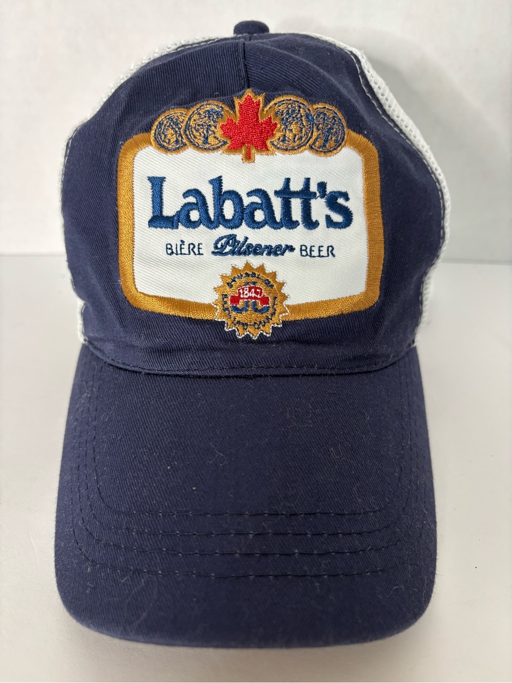 Navy Trucker Hat - Embroidered Logo
